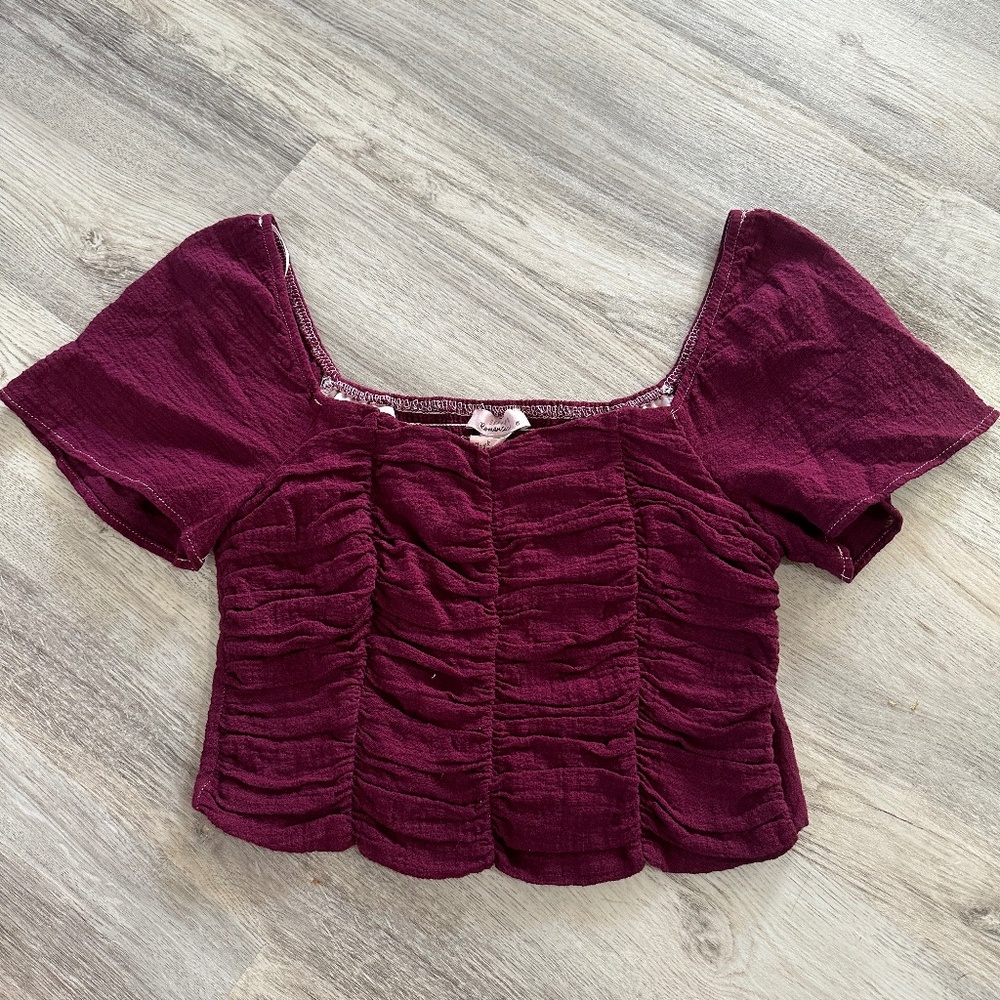 Brand new maroon ruffle top